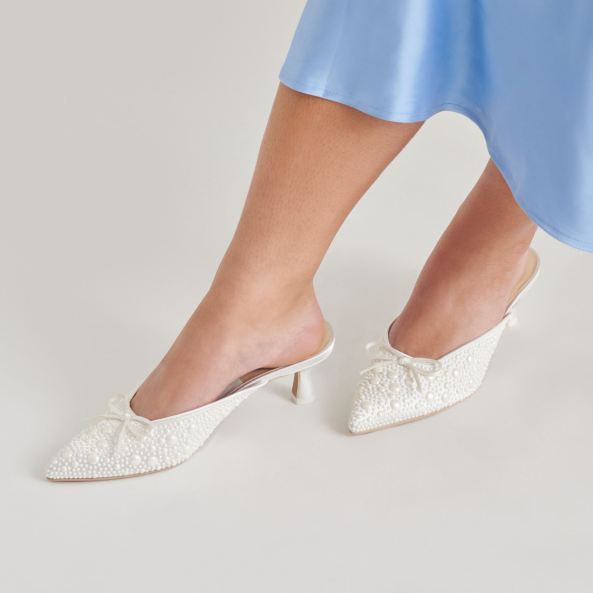DOLCEVITA-HEELS_CLAYTNPEARL_TRUEWHITESATIN-ONFOOT_02-1.jpg